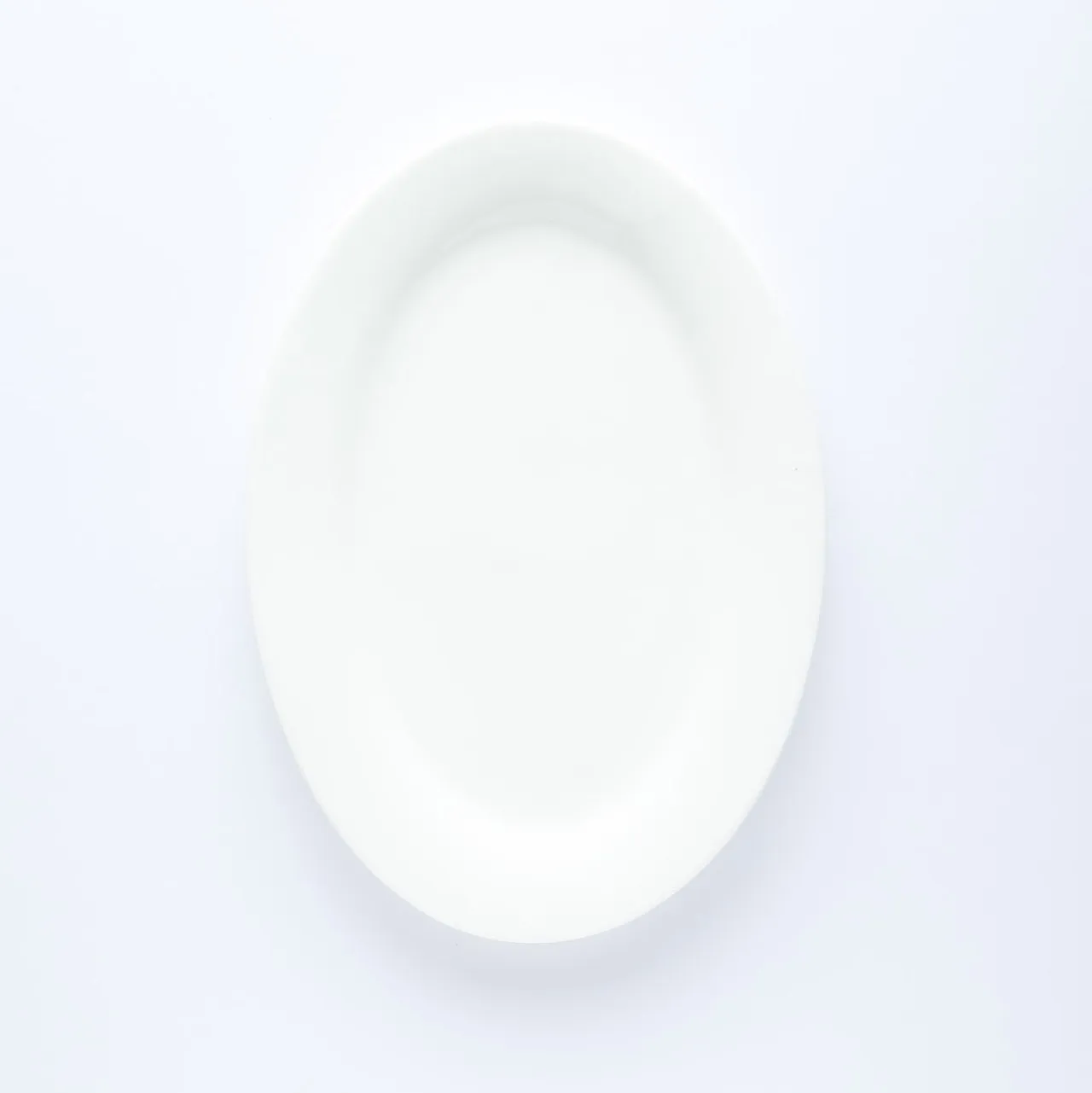 PL20-0100 - White Ceramic Plate - 7.75" 5.5" (LW)