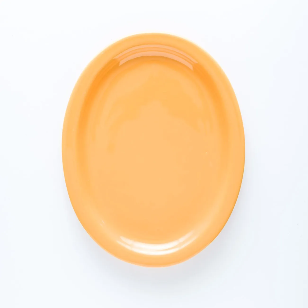 PL20-0065 - Orange Ceramic Plate - 9.5" 7.25" (LW)
