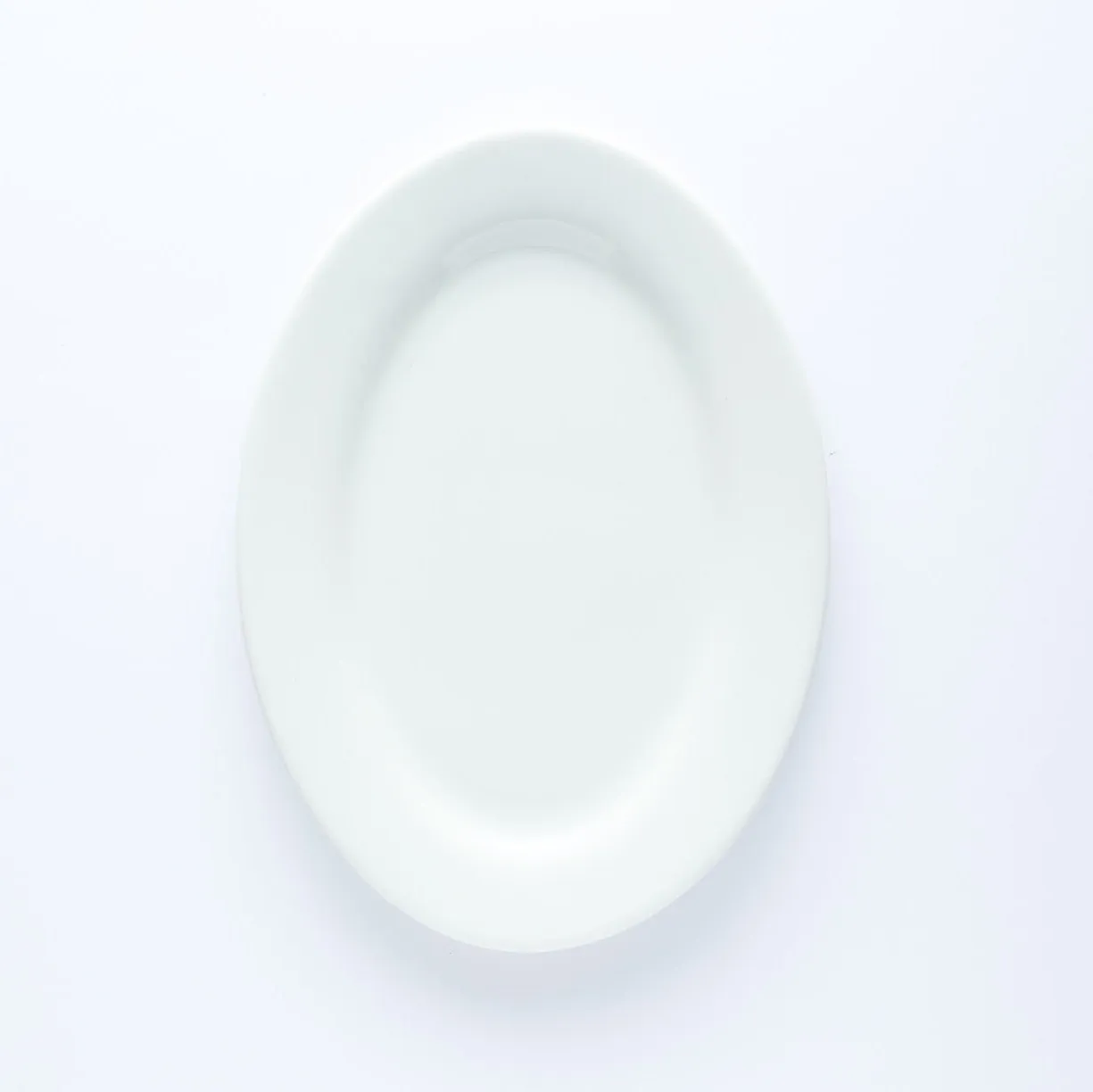 PL20-0099 - White Ceramic Plate - 8.75" 6.5" (LW)