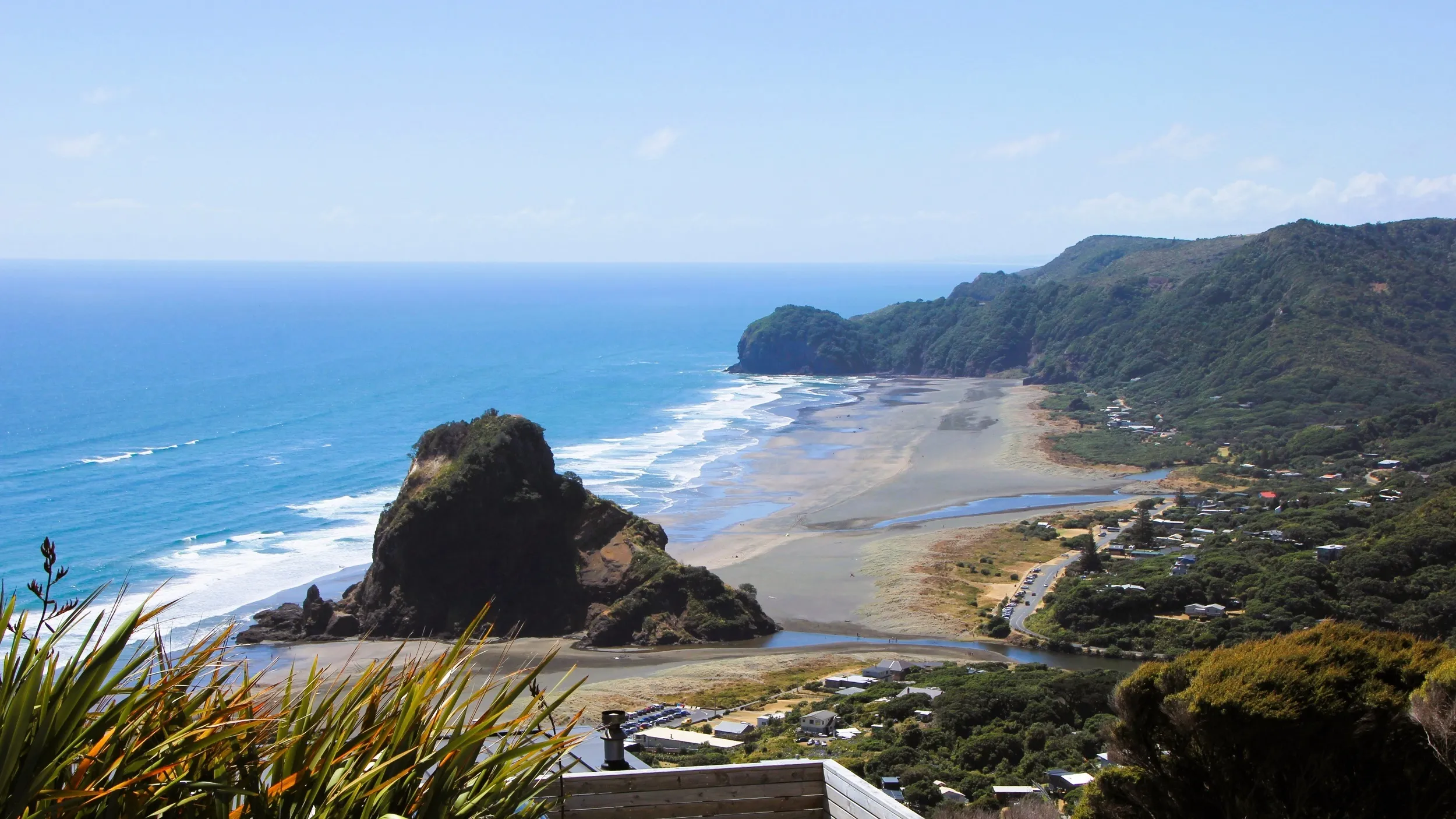 Piha Beach and Lion Rock viewed from a distance