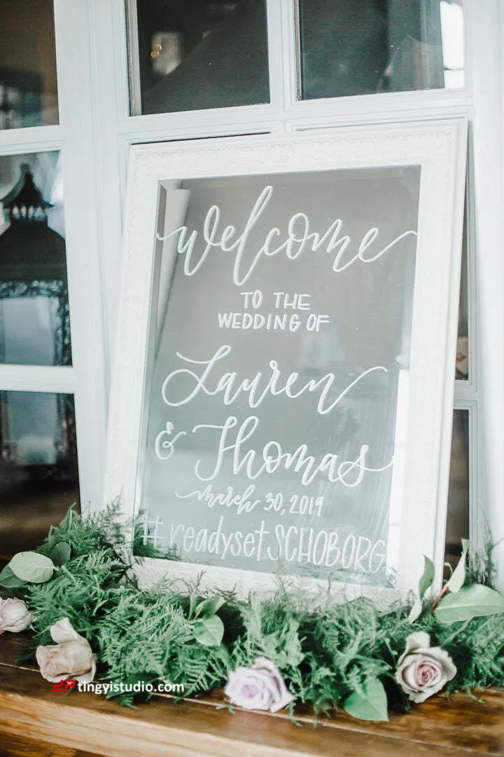 White mirror welcome sign 