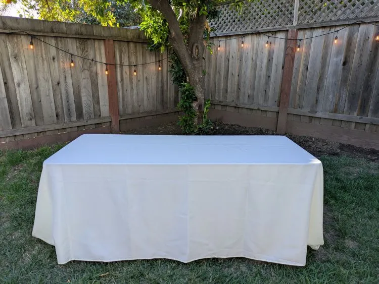 Cream tablecloth for 6ft rectangular table (90" x 132")