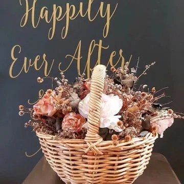 Vintage Wicker Basket with Dried Flowers and Pink Artificial