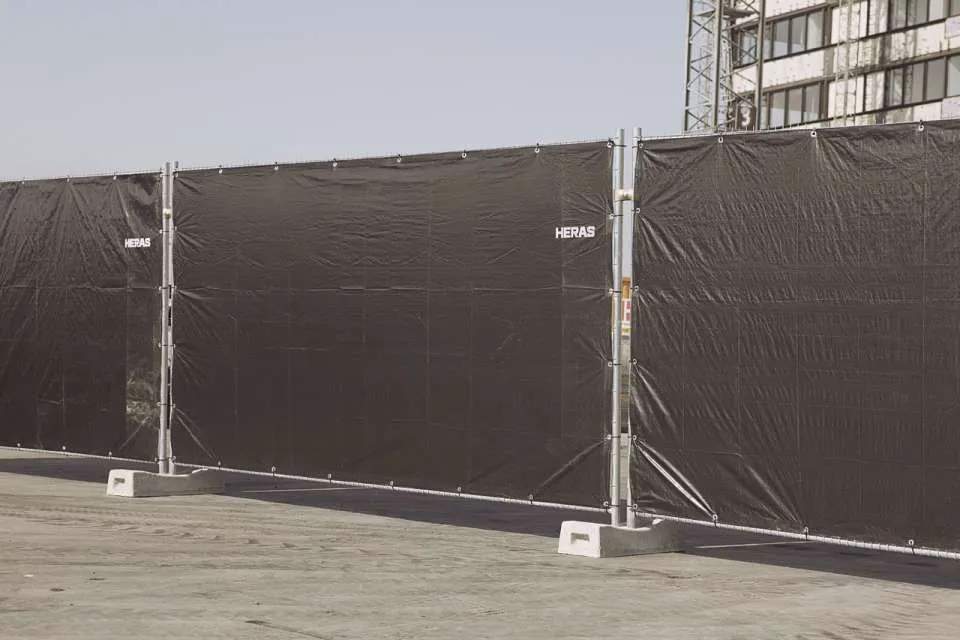 Heras hekken met doek