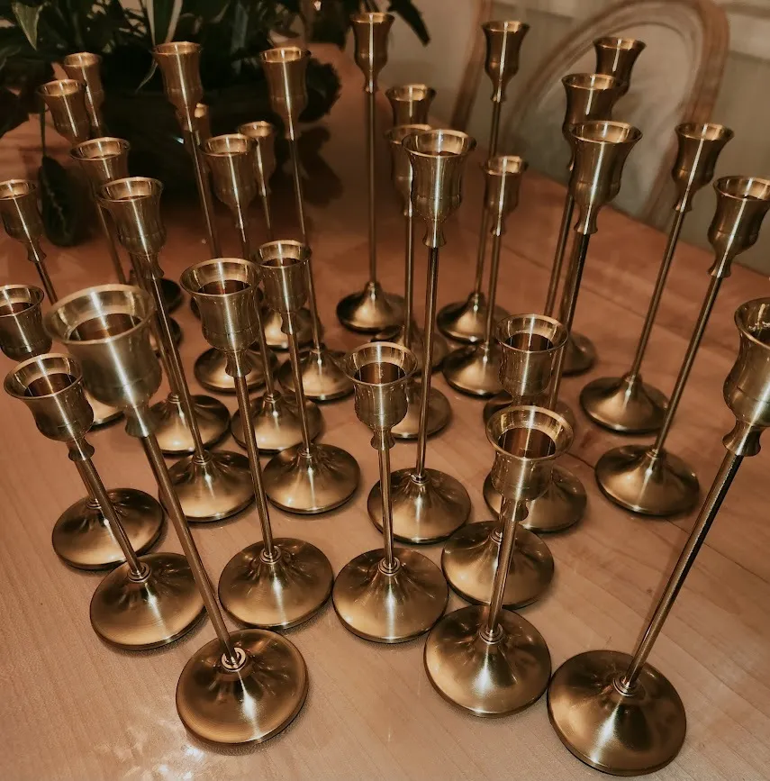 tall, medium, short golden color candlesticks