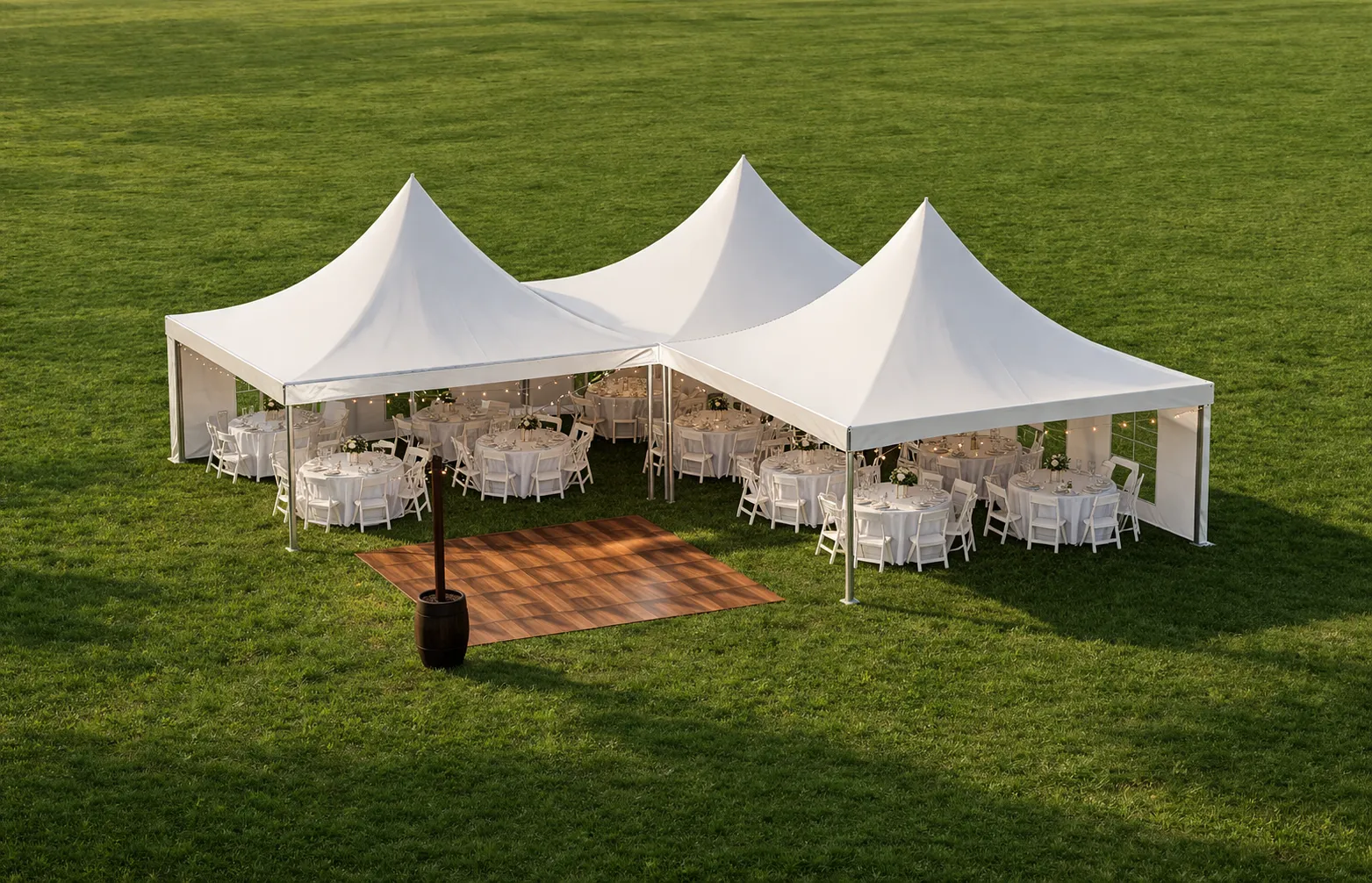 Wedding High-Peak Marquee Tent Package – 1,200 Sq Ft (Includes Tent, Tables & Seating for 96 Guests) Sidewalls, dance floor, lighting, and décor available for an additional fee and can be added during booking.