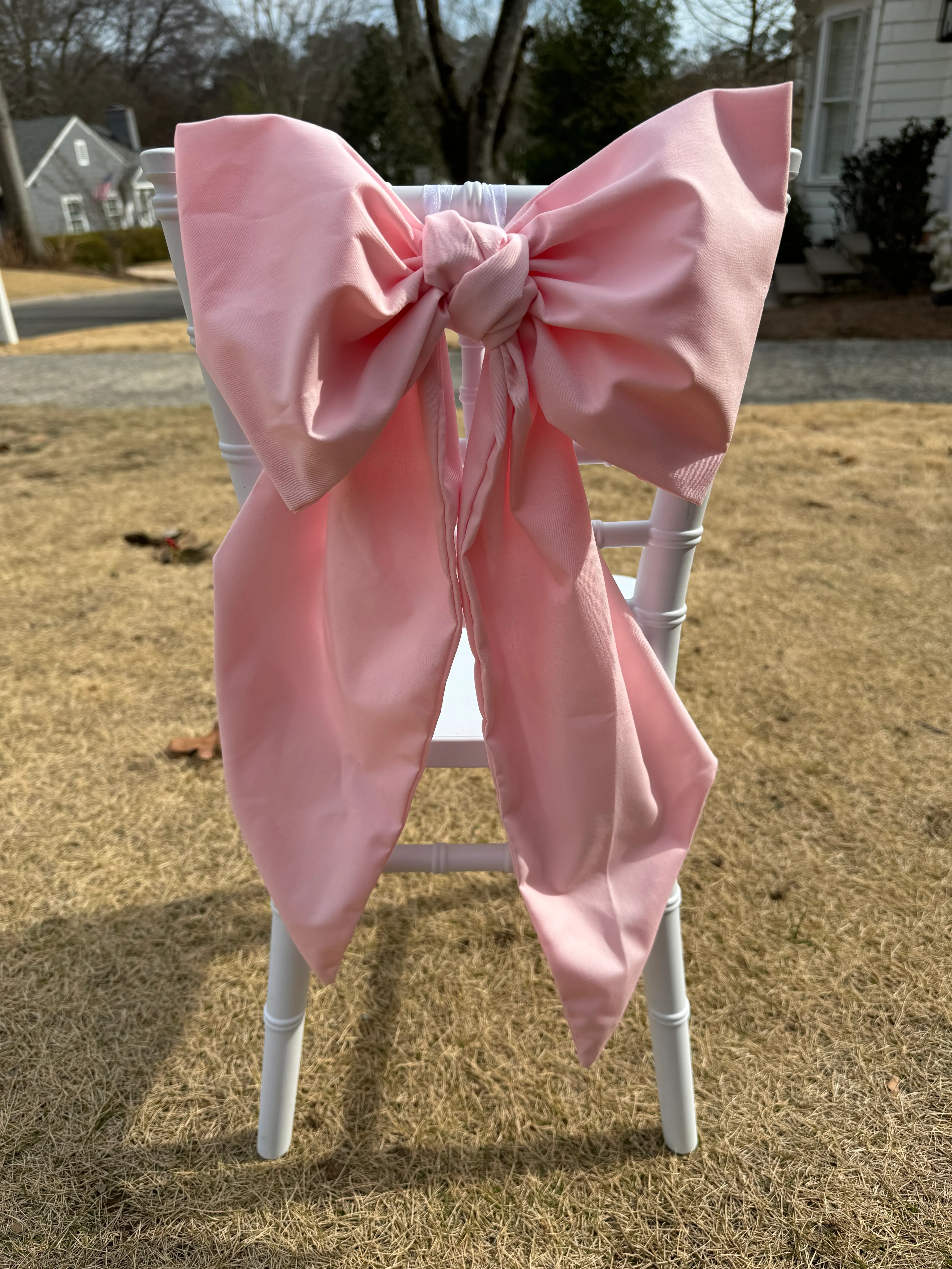 Pink chair back bows