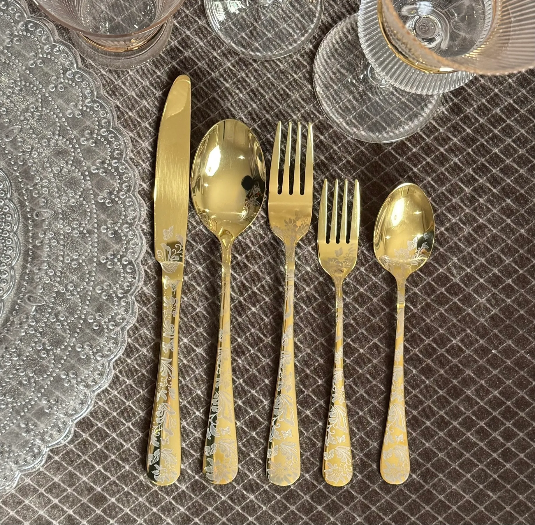 Gold cutlery with floral design