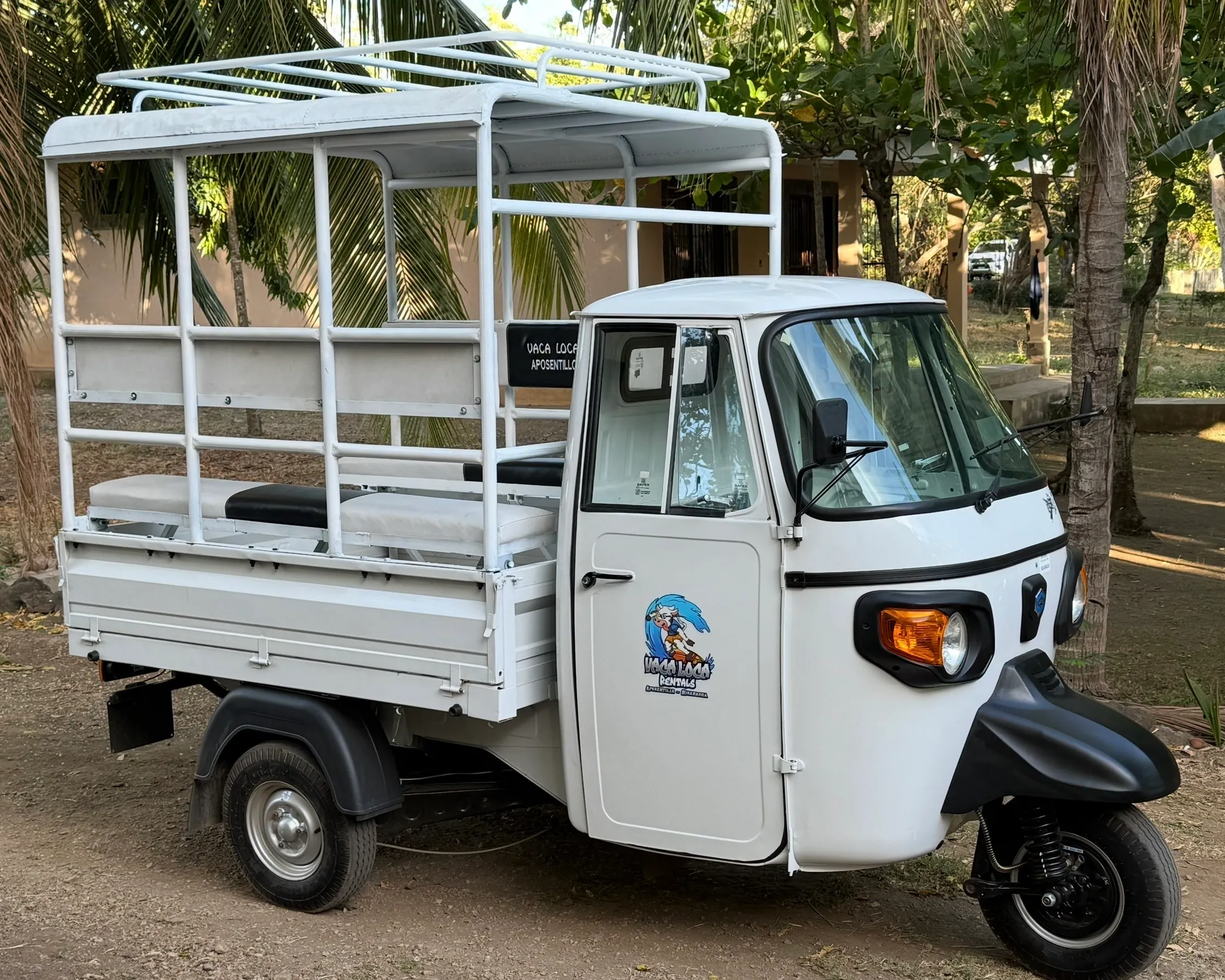 Tuk Tuk Piaggio w seating and surf rack