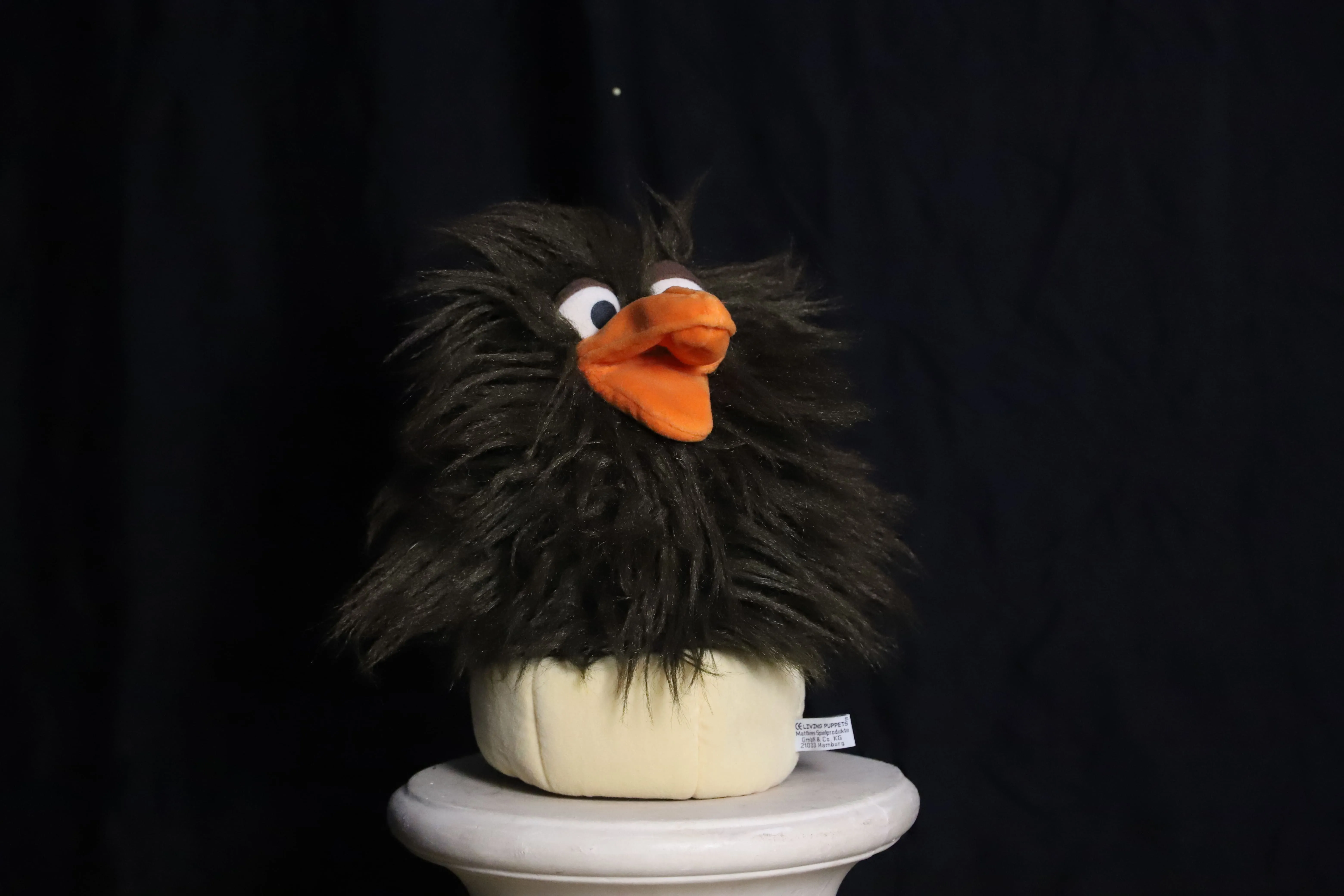 Handpuppe ( lustiger schwarzer Vogel im Nest )