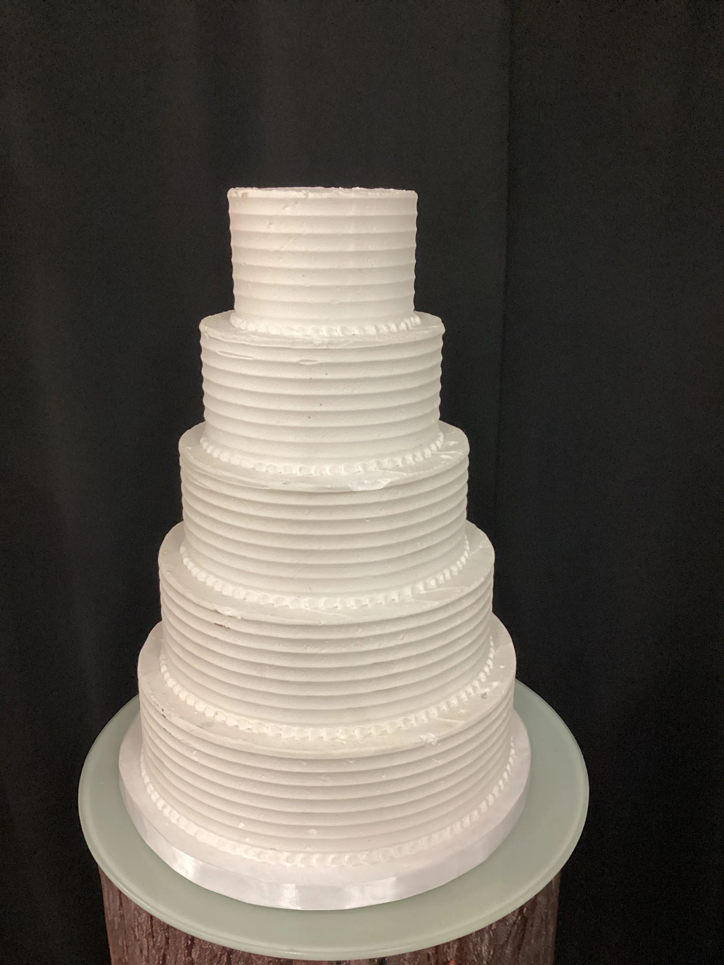 5 Tier white fake cake