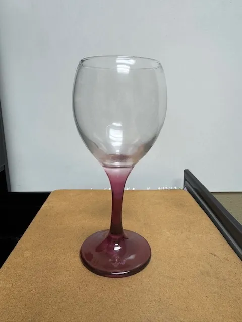Purple stemmed wine glass