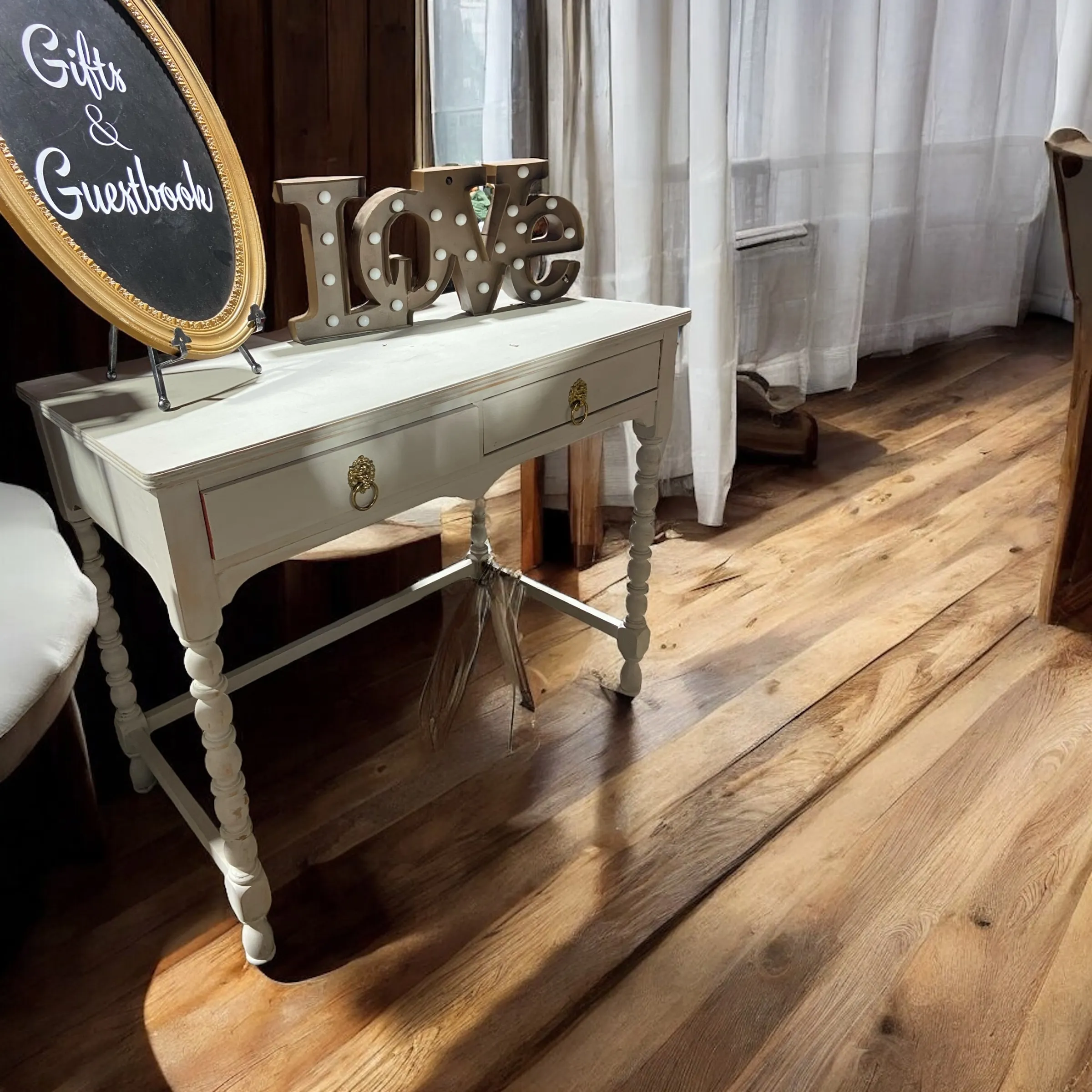 White Table with Gold Lion Head Handle Pulls