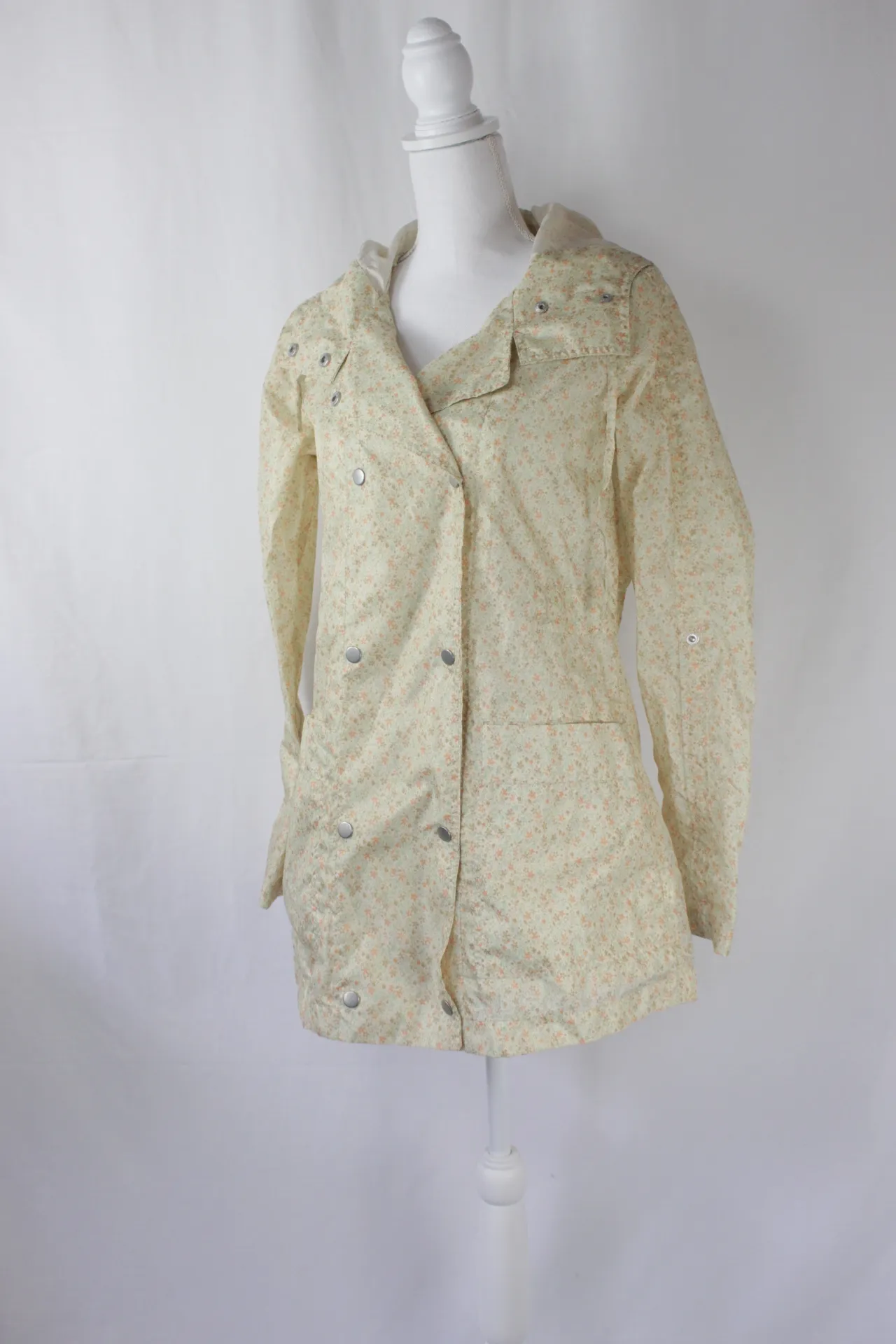 Cream Raincoat With Green And Orange Leaf Pattern
