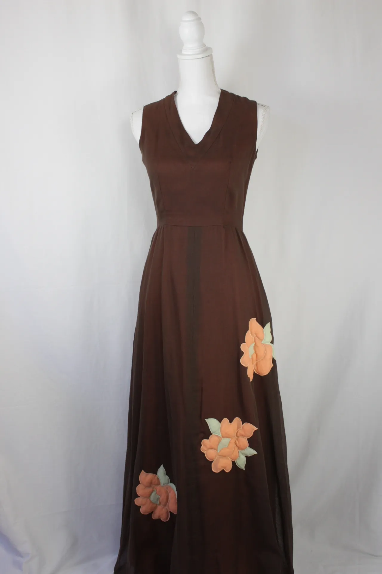 Brown Dress With Pink Floral Pattern And Matching Jacket