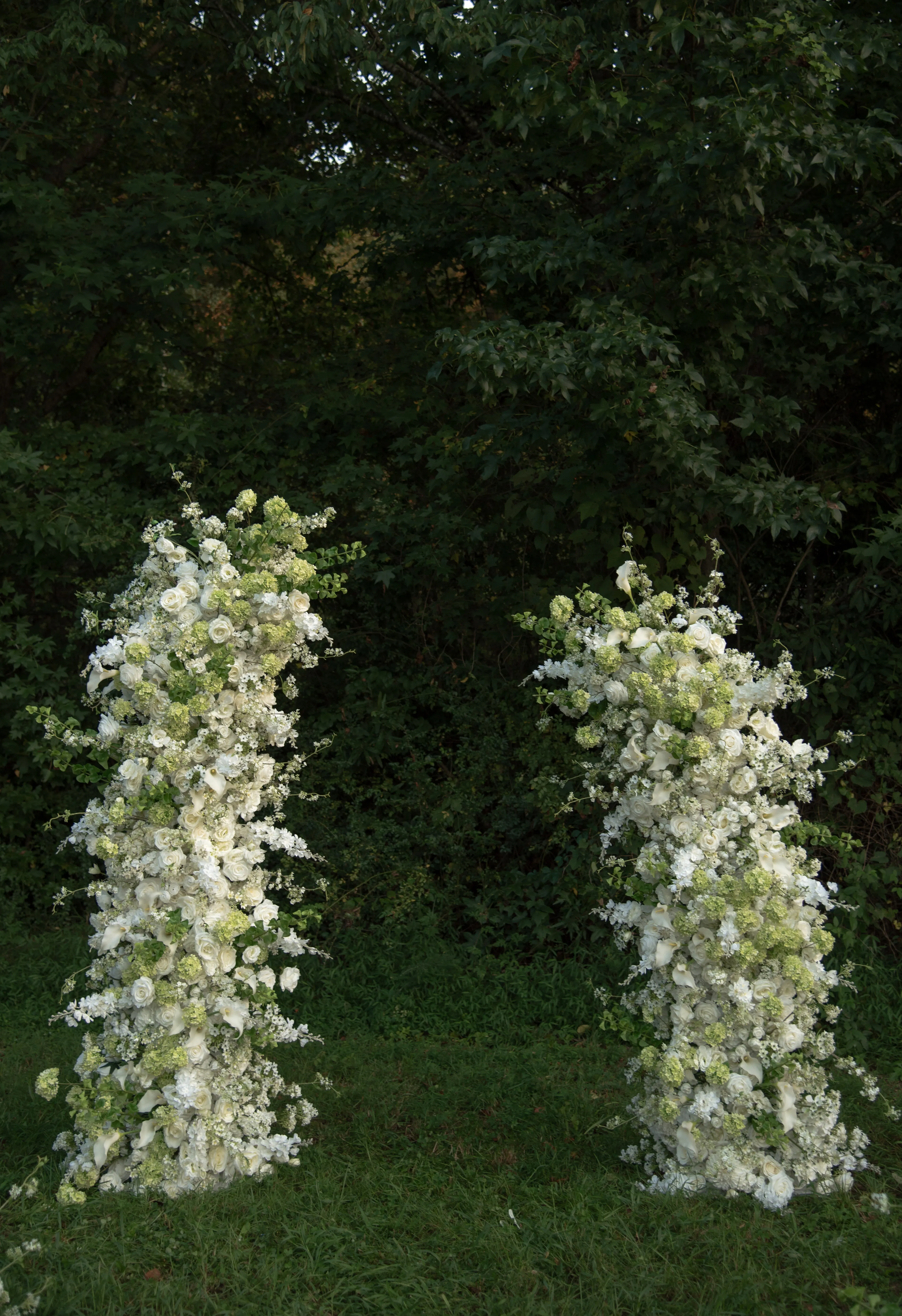 White and Green Artificial Flower Arch