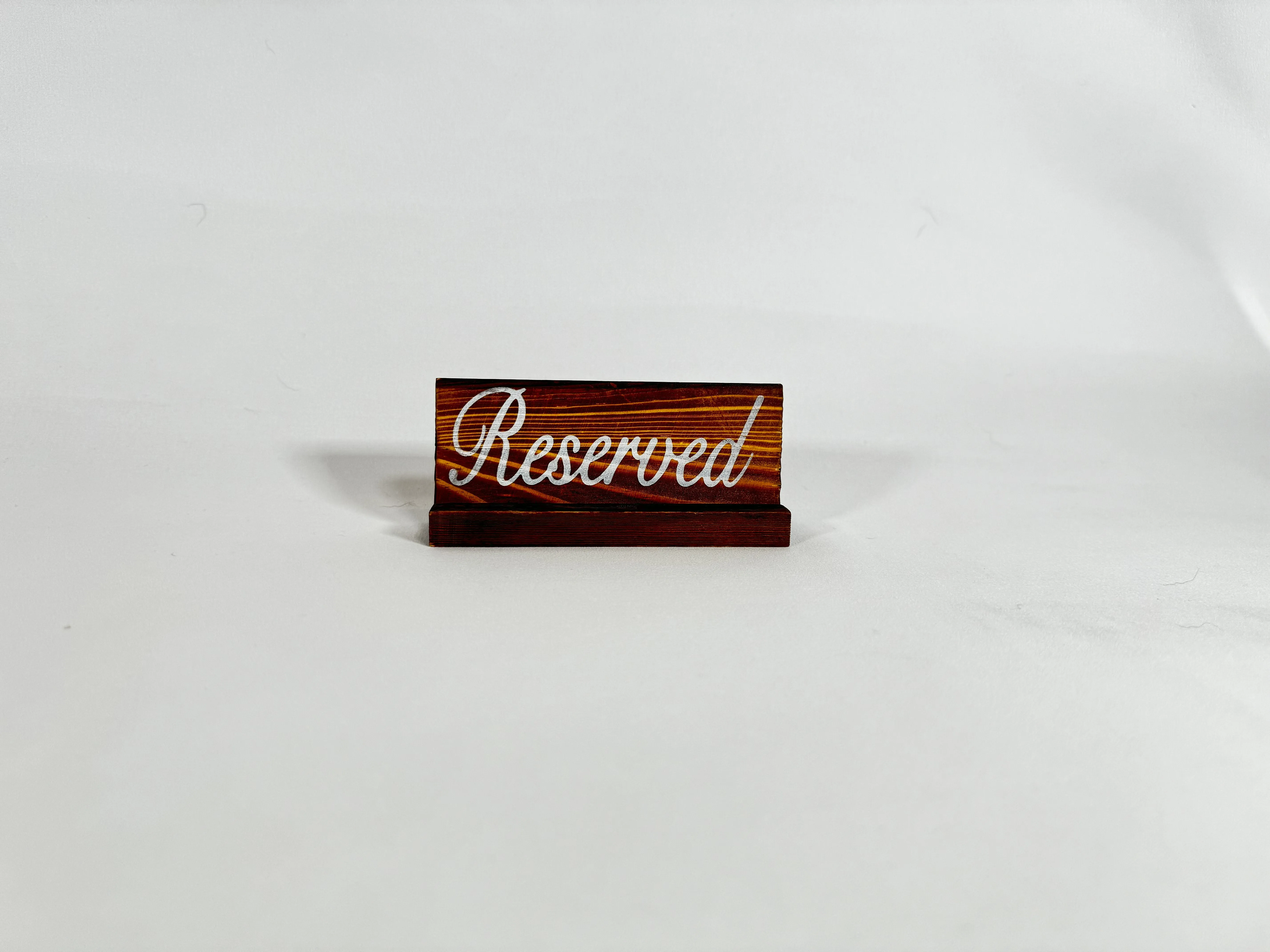Wood reserved sign with stand