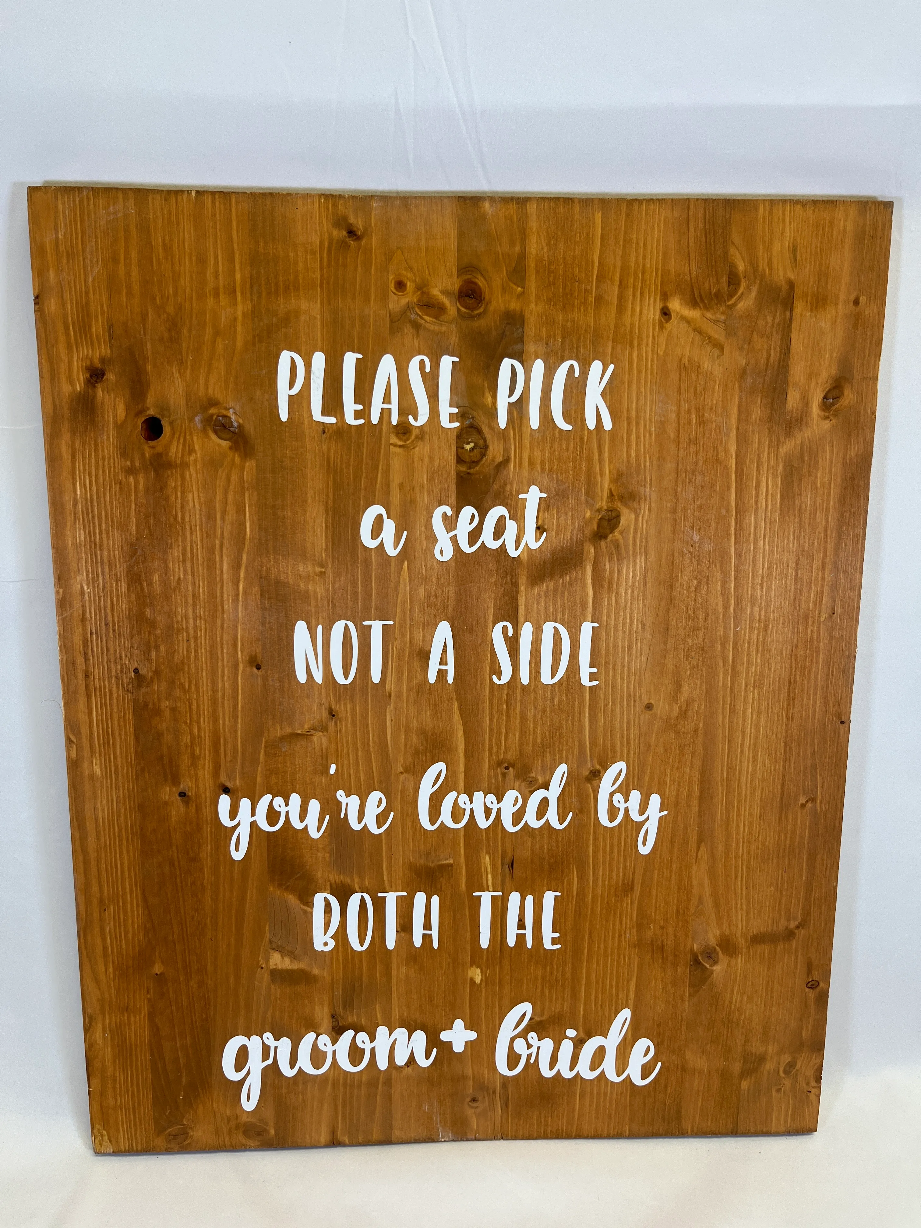 Wooden please pick a seat sign