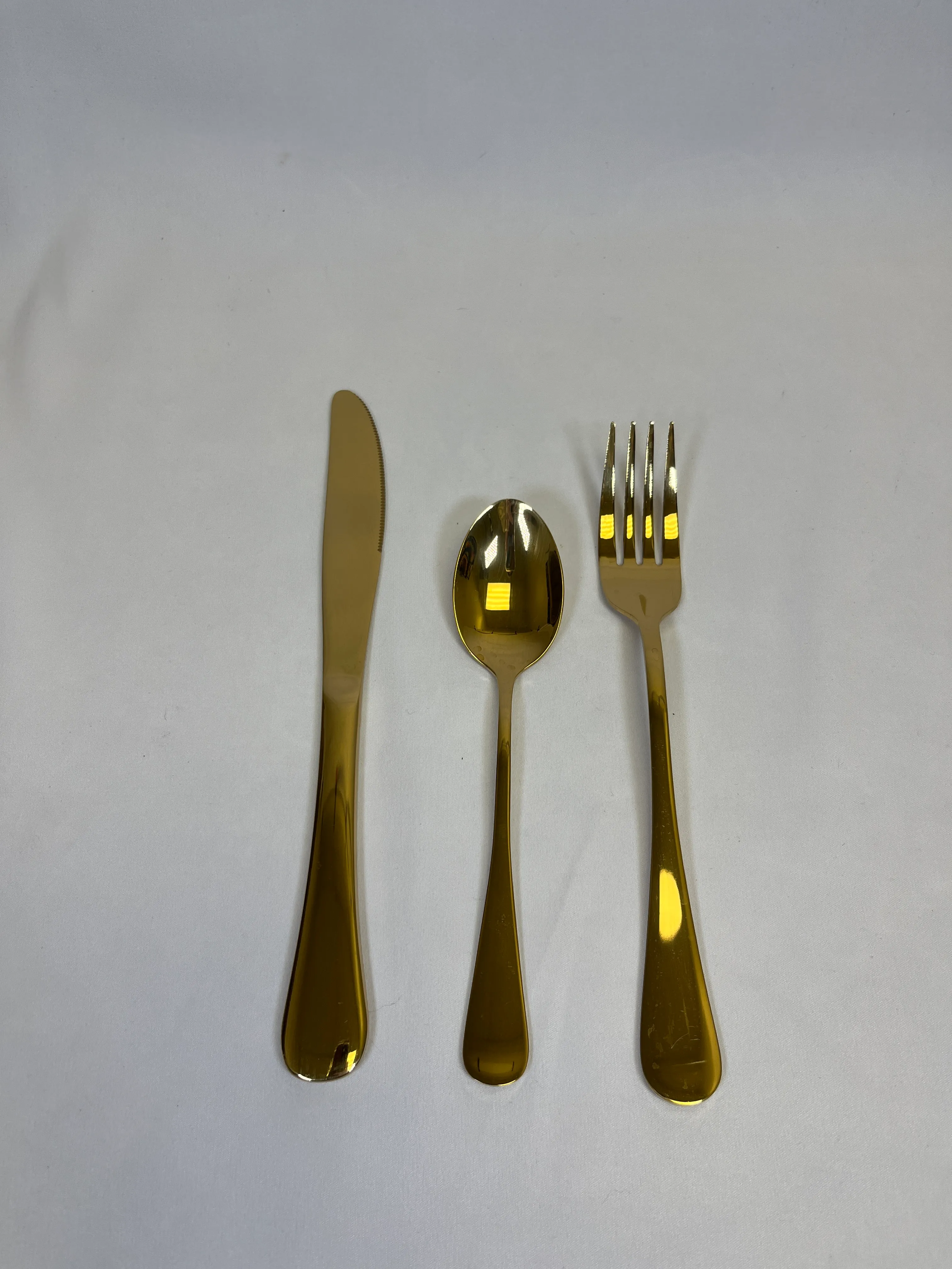 Gold Knife, tea spoon, & dinner fork silverware set