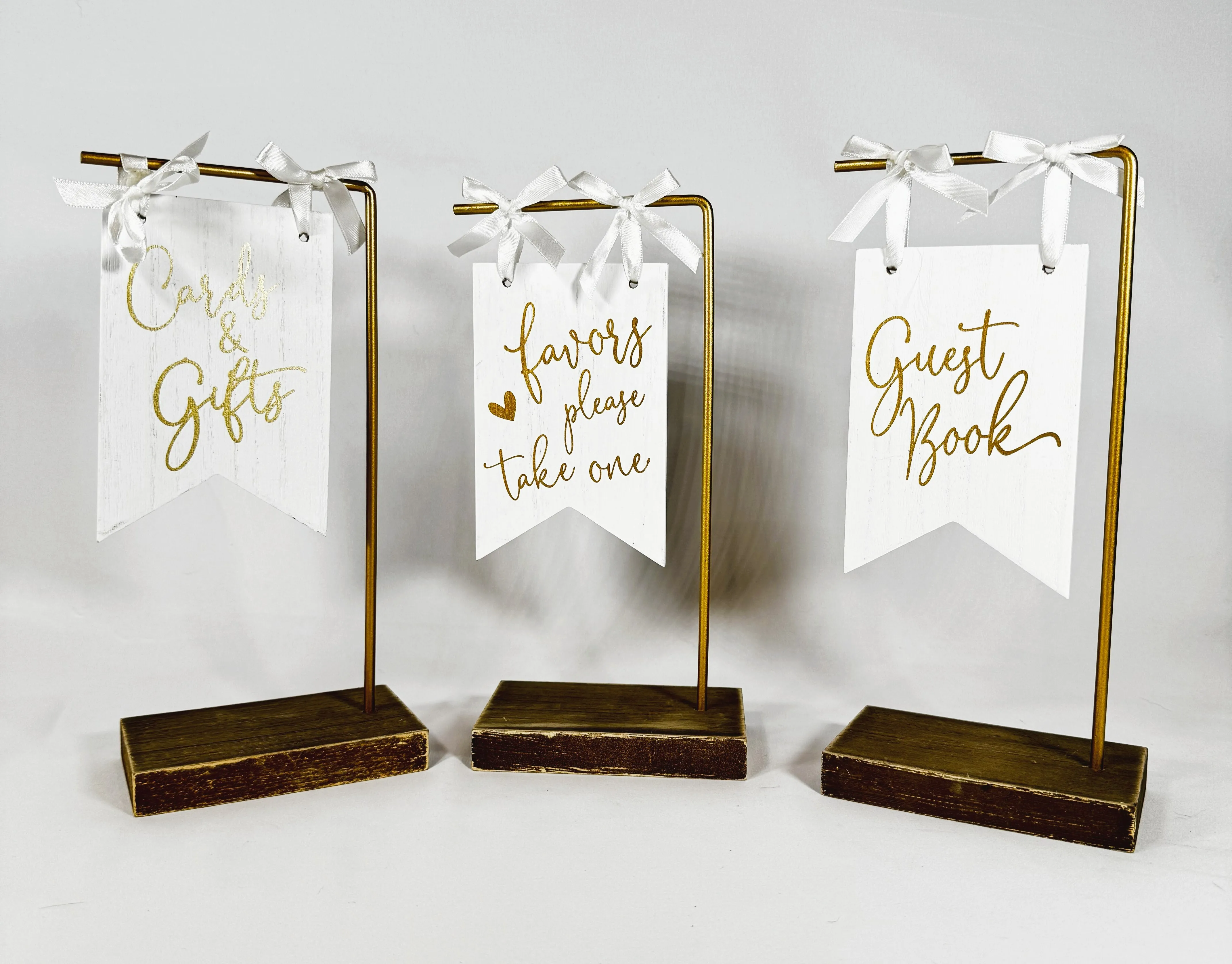 Set of Three Gold and White Signs