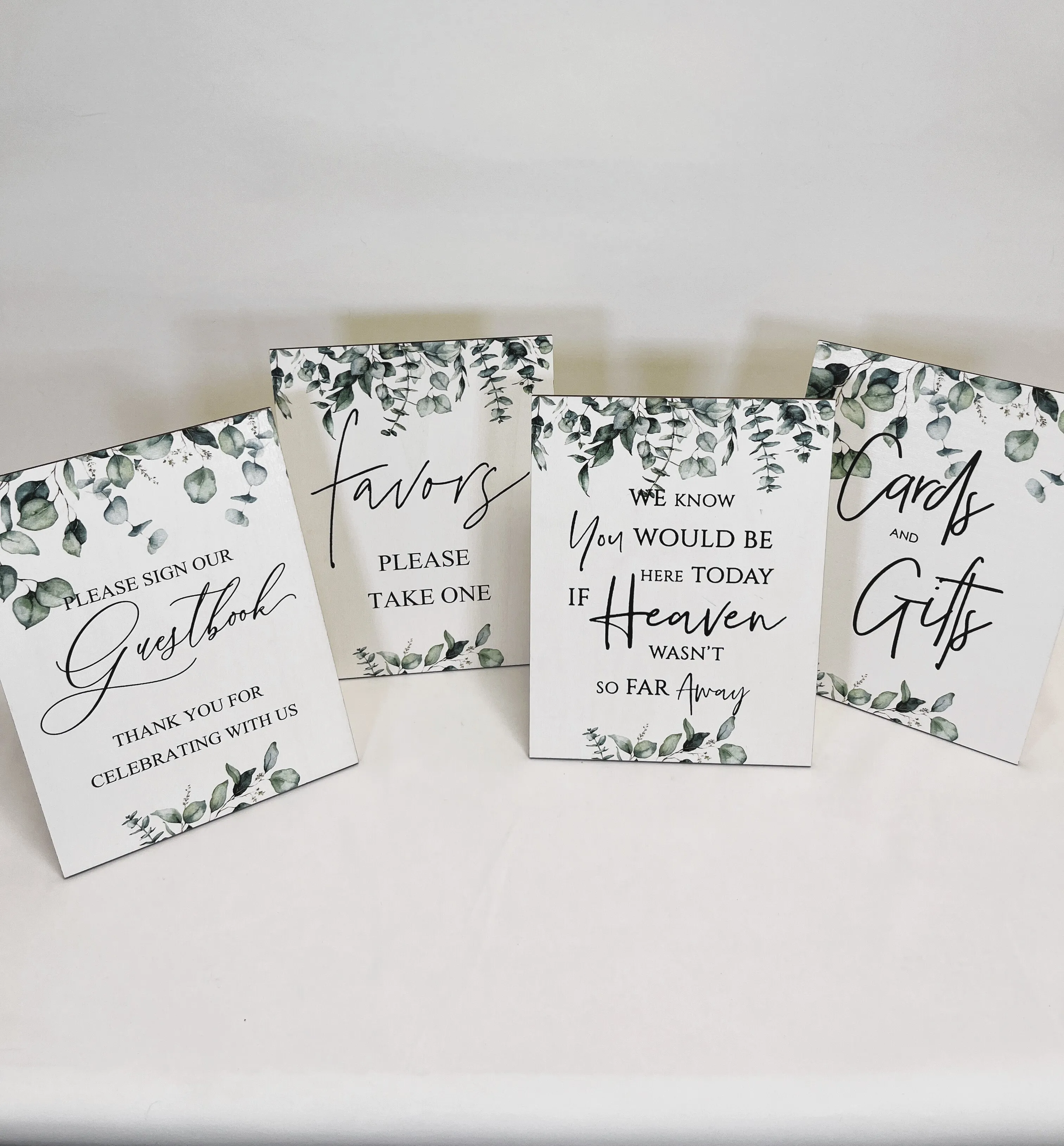 Set of 4 Signs with Green Leaves