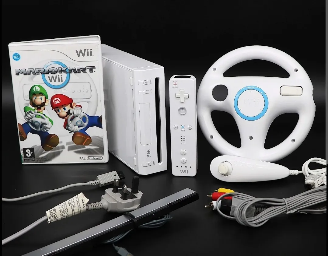 Nintendo Wii (including 2 steering wheels & Mario Cart)