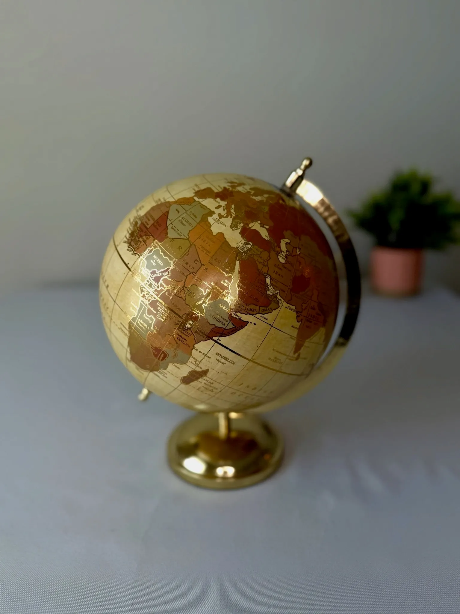 Gold and Tan Globe Med