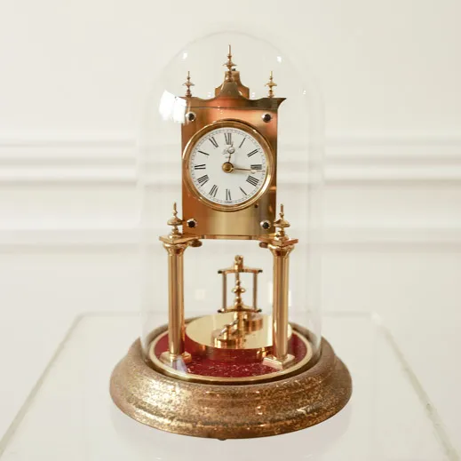 Gold Clock in Cloche