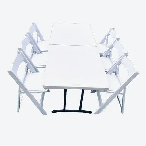 6 ft table and 6 white resin chairs