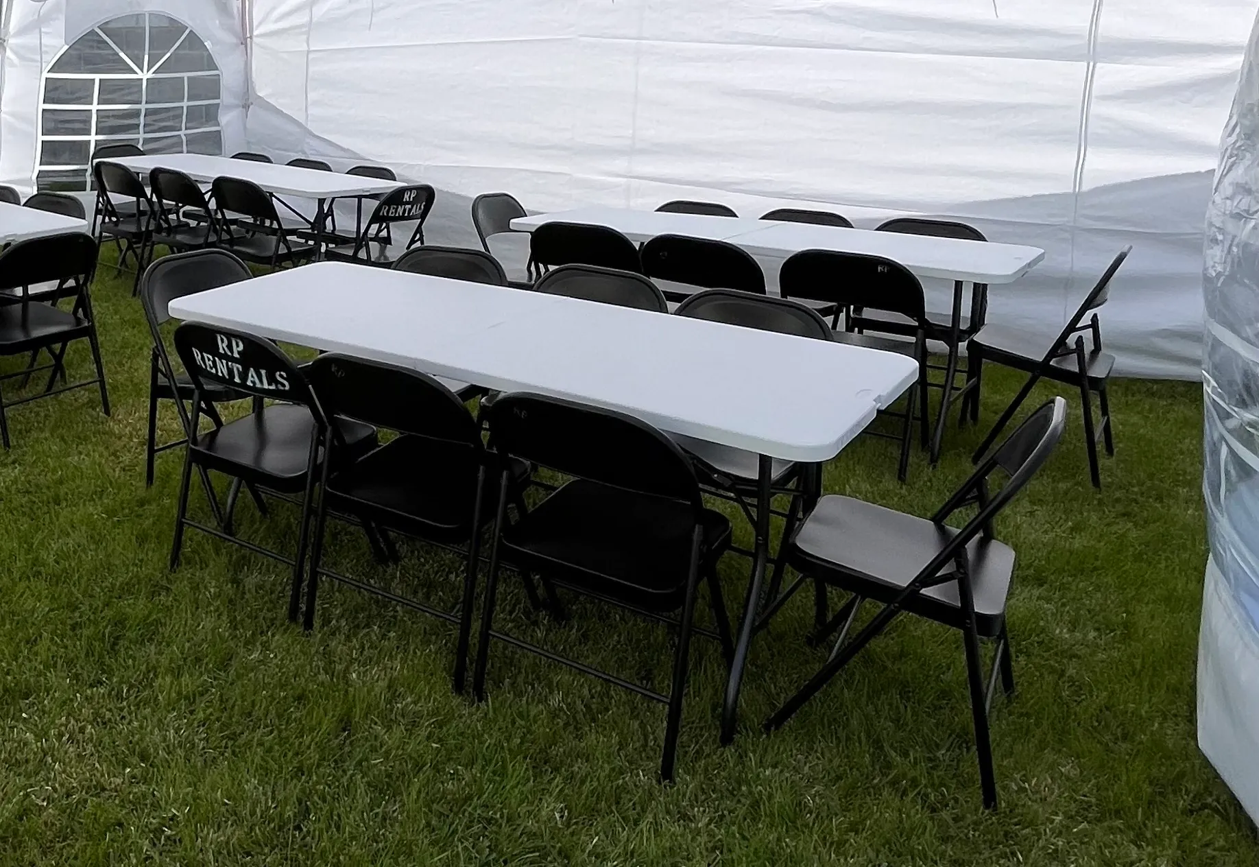 6ft table and 6 black metal chairs