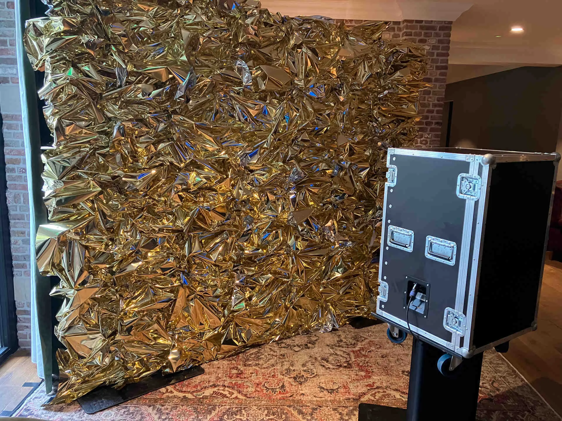 Een Photobooth voor een gouden metallic schimmerwall