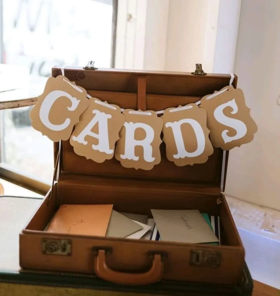 Vintage brown suitcase w/ CARDS sign