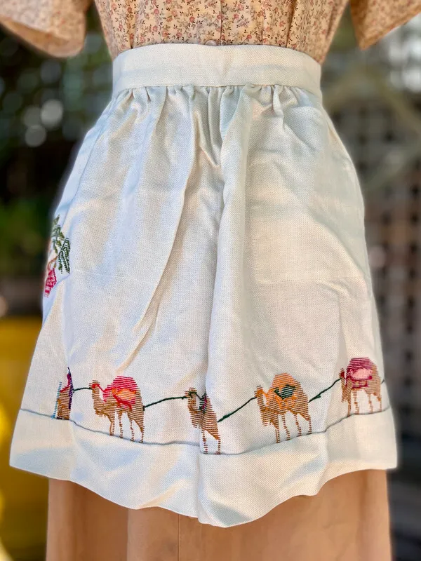 White Apron with Cross-Stitch Camel Motif and Pocket