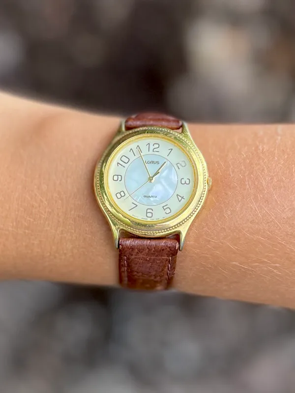 Leather Band Wrist Watch with Circular Gold-Rimmed Face