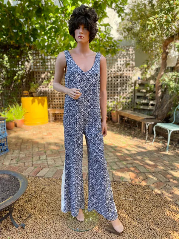 Sleeveless Bellbottom Jumpsuit with Lace Inserts