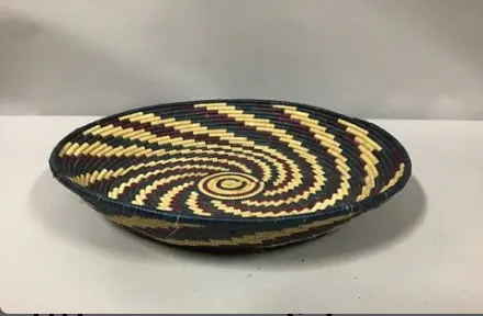 spiral design flat woven basket african 