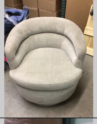 padded cream swivel chair 
