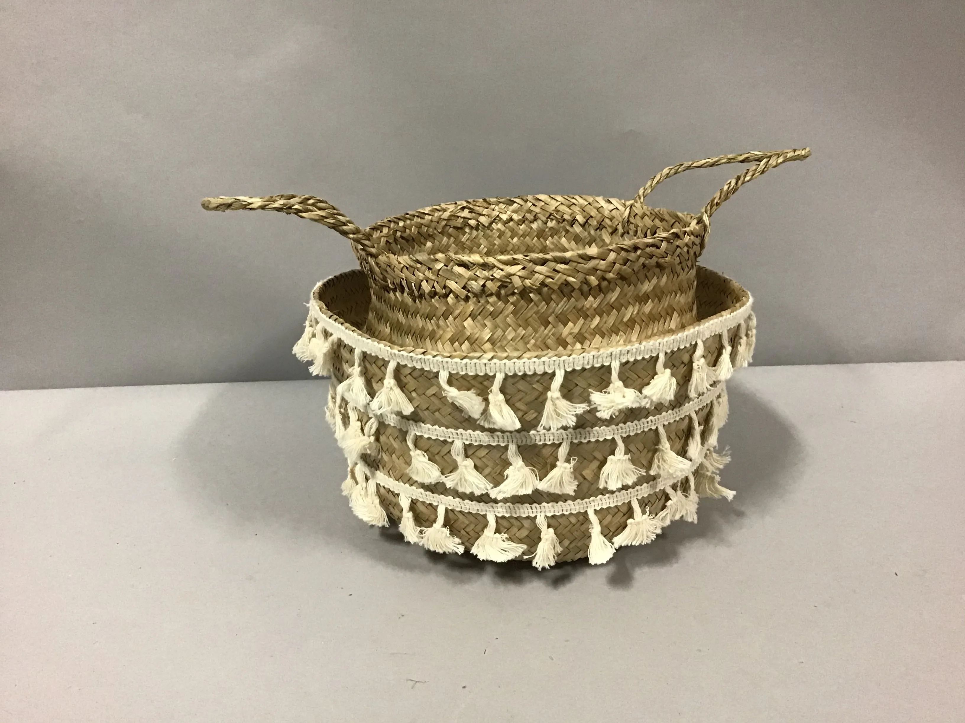 woven basket with fringe tassles 