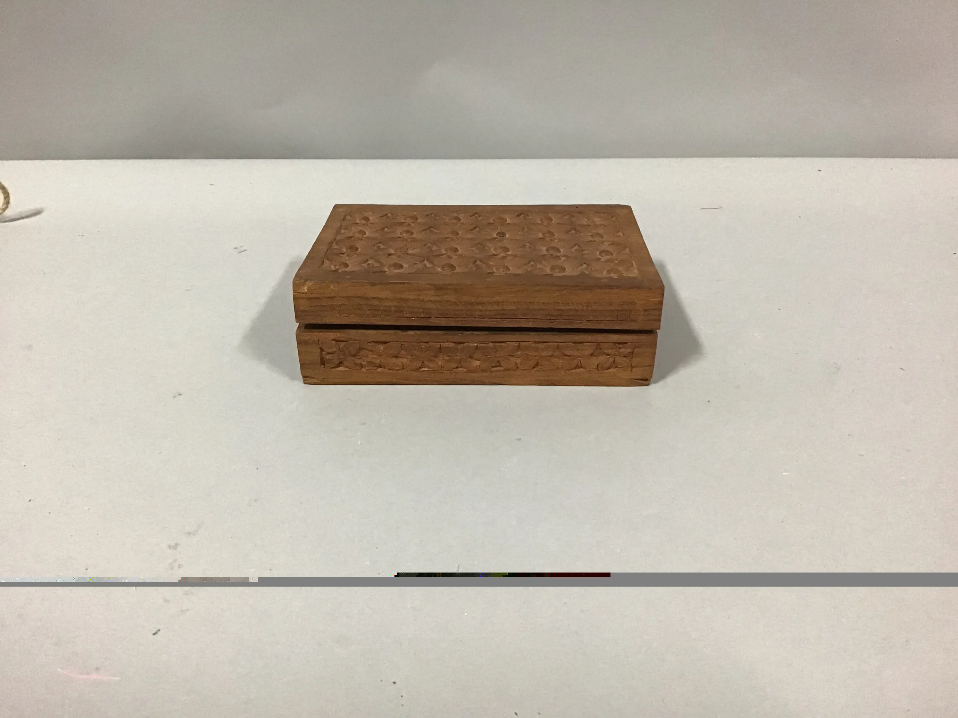 rosewood jewelry box carved 7"lx 5"