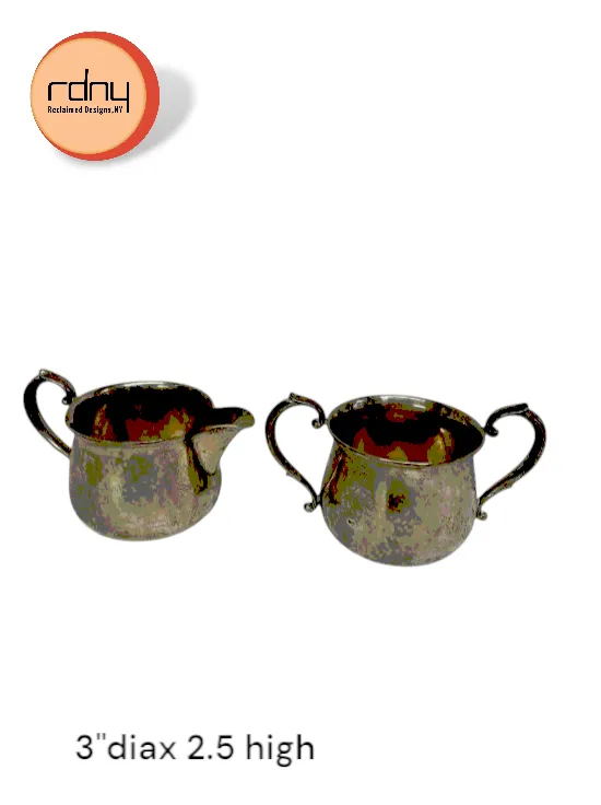 silver sugar and creamer from silver tea set