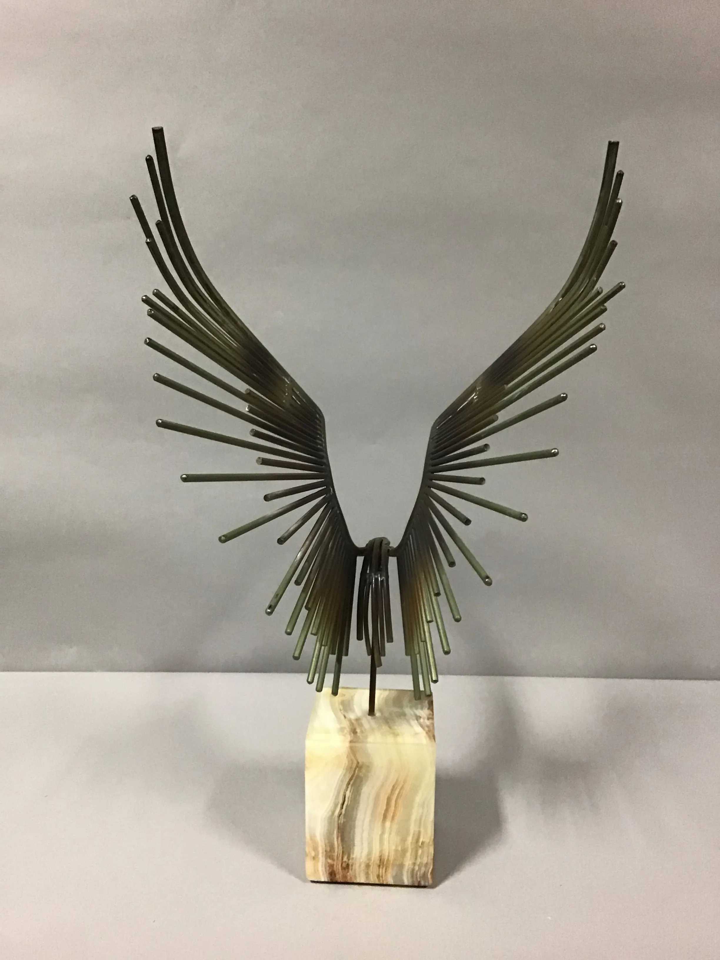 Curtis c. Jeres  brutalist metal  " bird in flight"  sculpture with marble base  wings