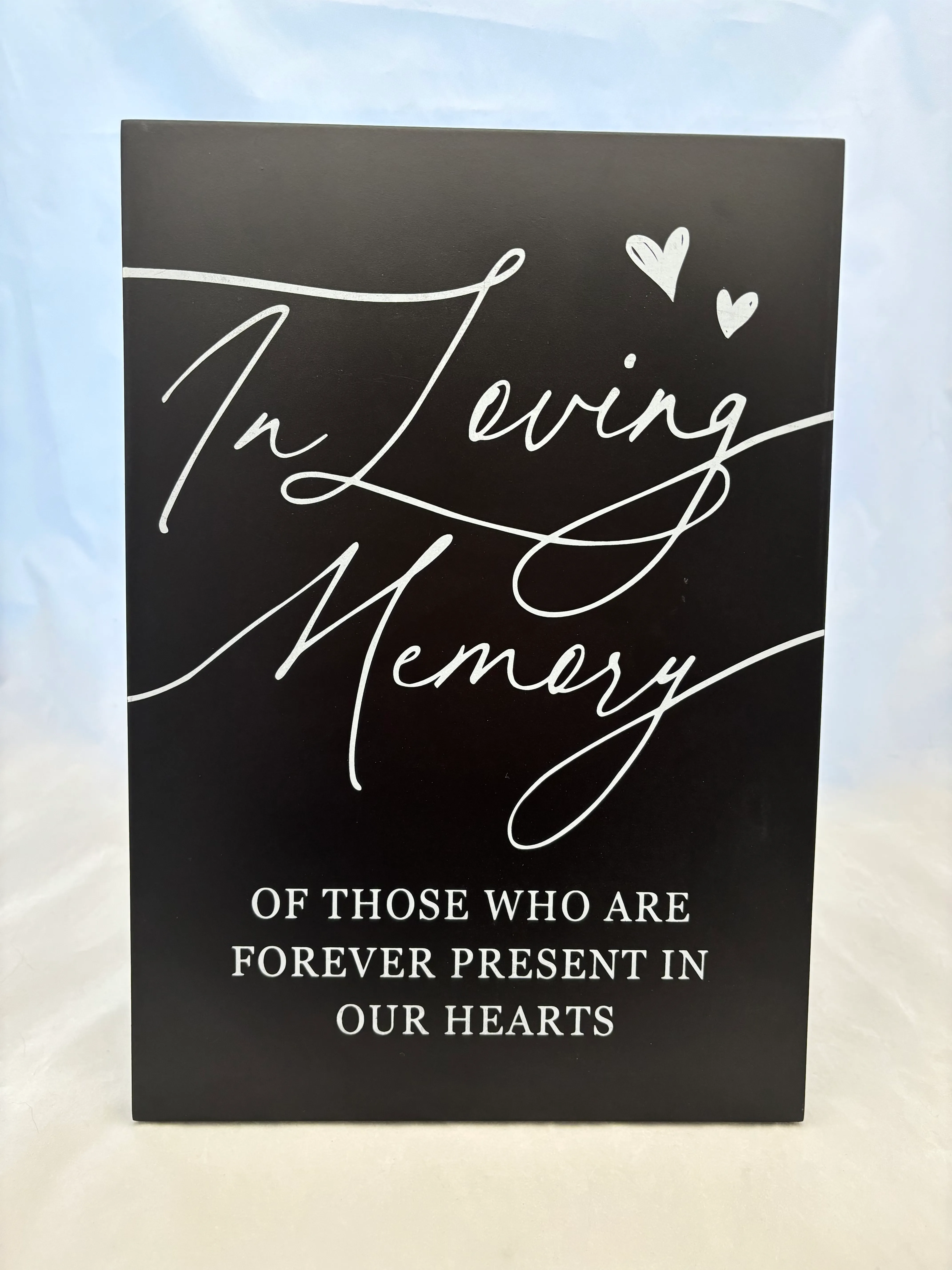 Black “In Loving Memory” Sign