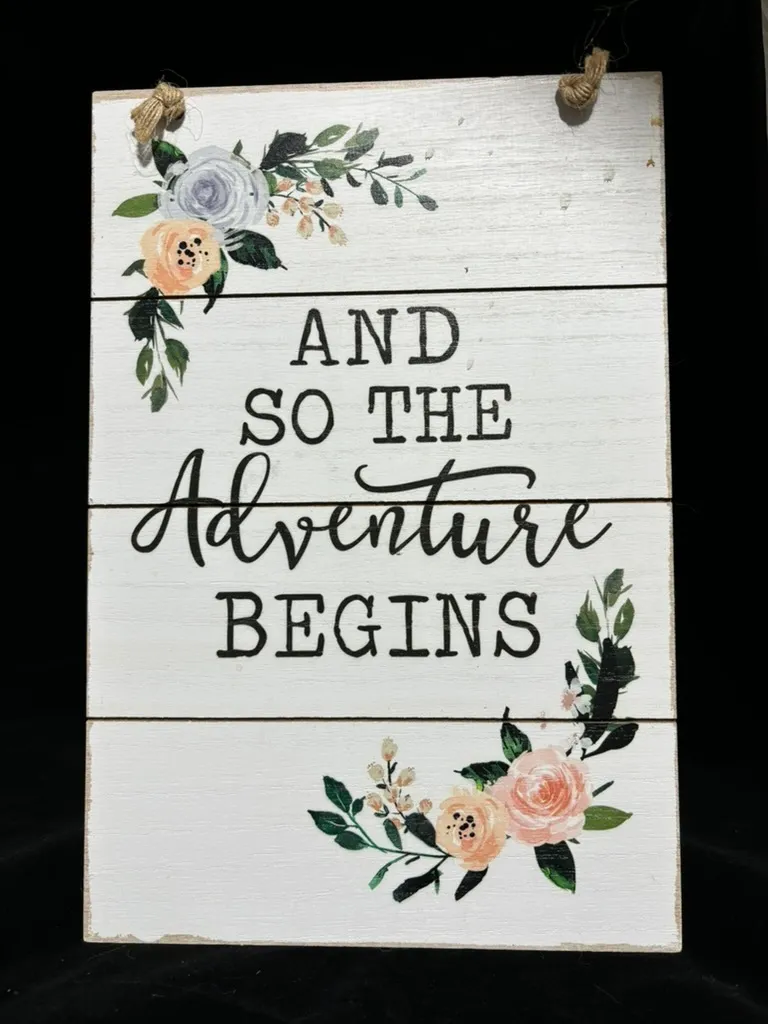 Floral “Adventure Begins” Sign