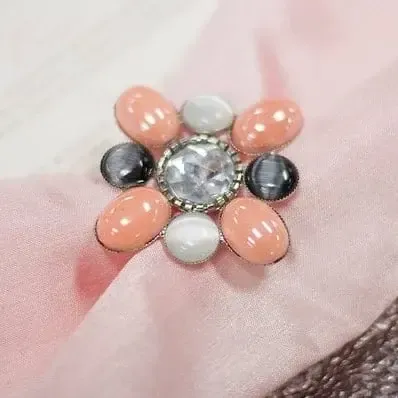 CORAL AND BLACK EMBELLISHMENT WITH CRYSTAL BROOCH
