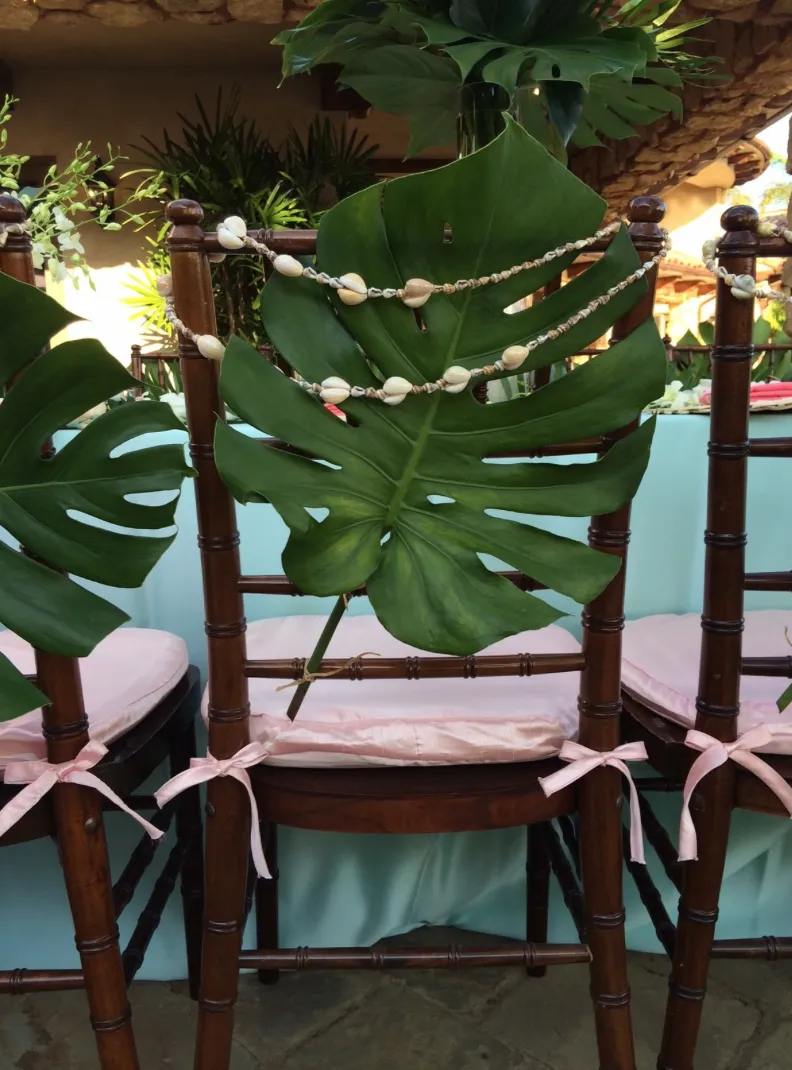 MONSTERA LEAVES & COWRIE SHELL GARLANDS CHAIR DECOR