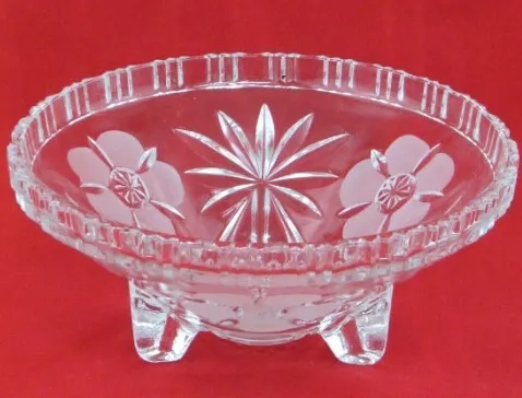 3 footed crystal bowl with flowers and starburst