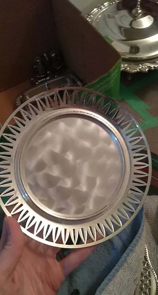 Polished round silver plate with sunburst cutouts - small