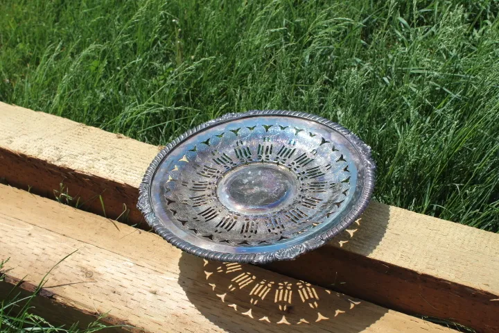 Tarnished silver platter with pedestal base
