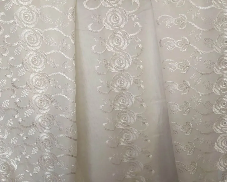 Champagne sheers with rosettes  - email us directly if you wish to rent this product