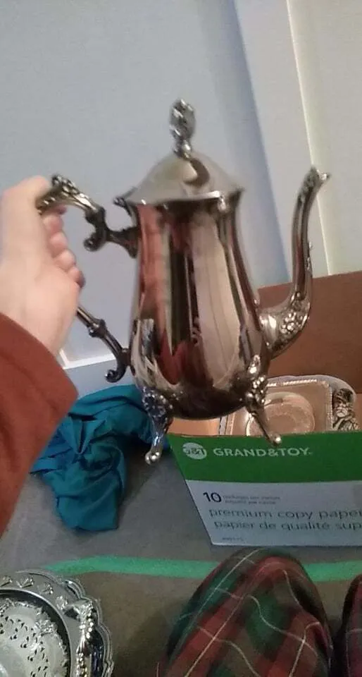 Polished silver coffee set with matching cream and sugar